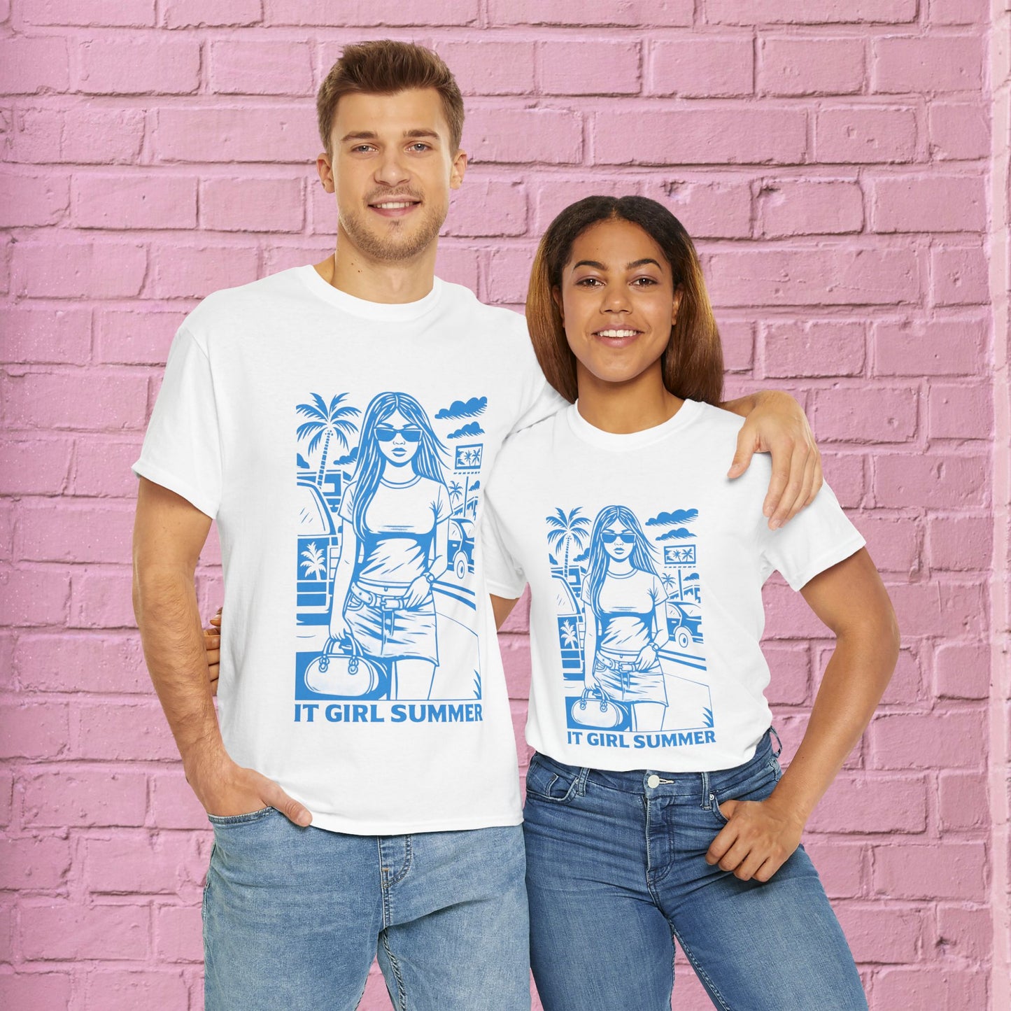 Two people wearing white t-shirts with a blue graphic design against a pink brick wall.